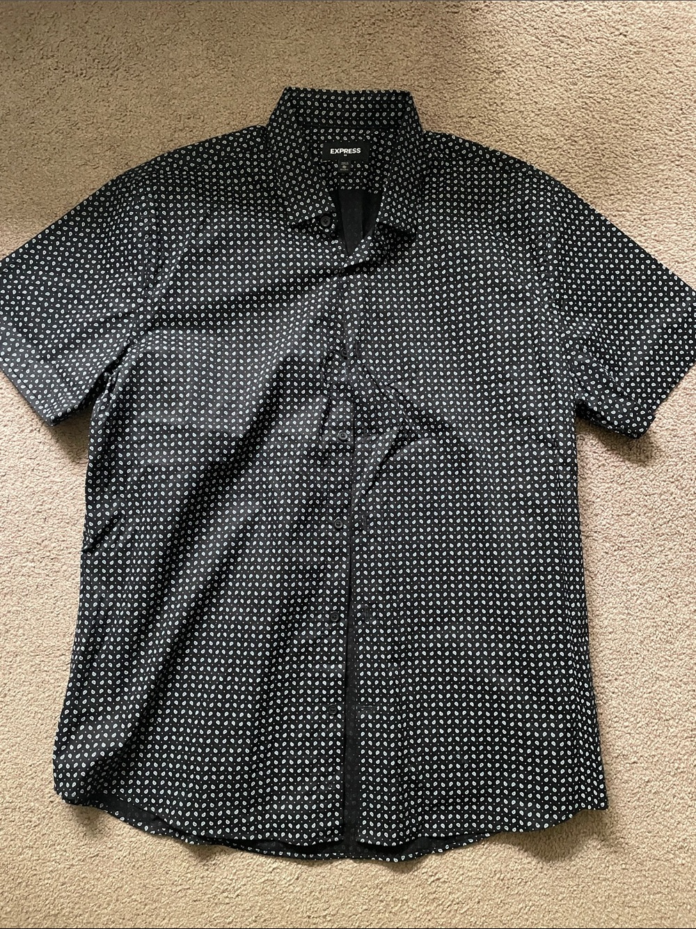 Men’s button down short- sleeve shirt. Black with white paisley print
